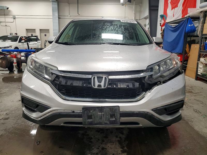 Photo 5 from auction – 2015 HONDA CR-V SE with VIN 2HKRM4H41FH109606