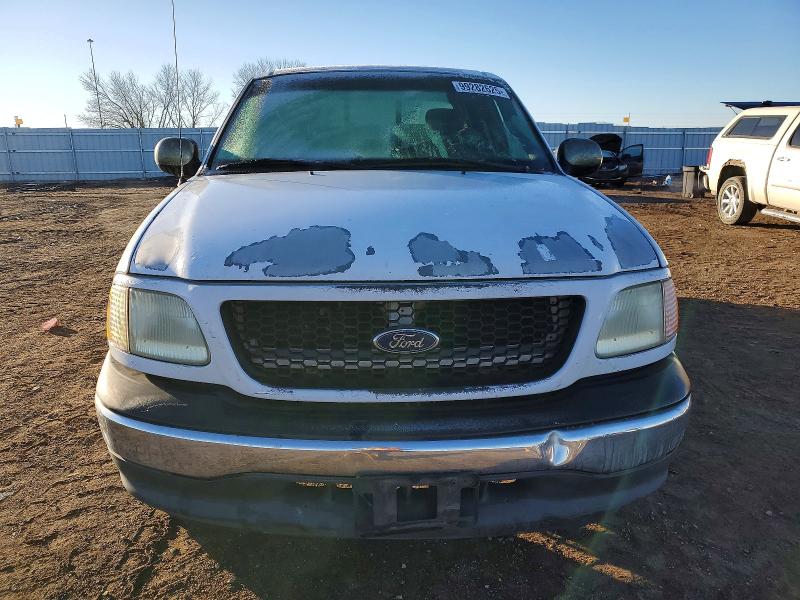 Photo 5 from auction – 2001 FORD F150 with VIN 1FTRX07WX1KC65317