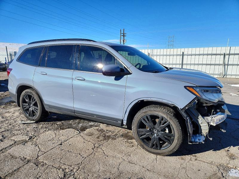 Photo 4 from auction – 2022 HONDA PILOT BLAC with VIN 5FNYF6H7XNB060897