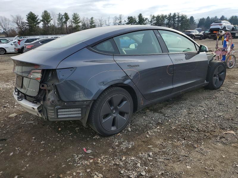 Photo 3 from auction – 2021 TESLA MODEL 3 with VIN 5YJ3E1EB9MF849033