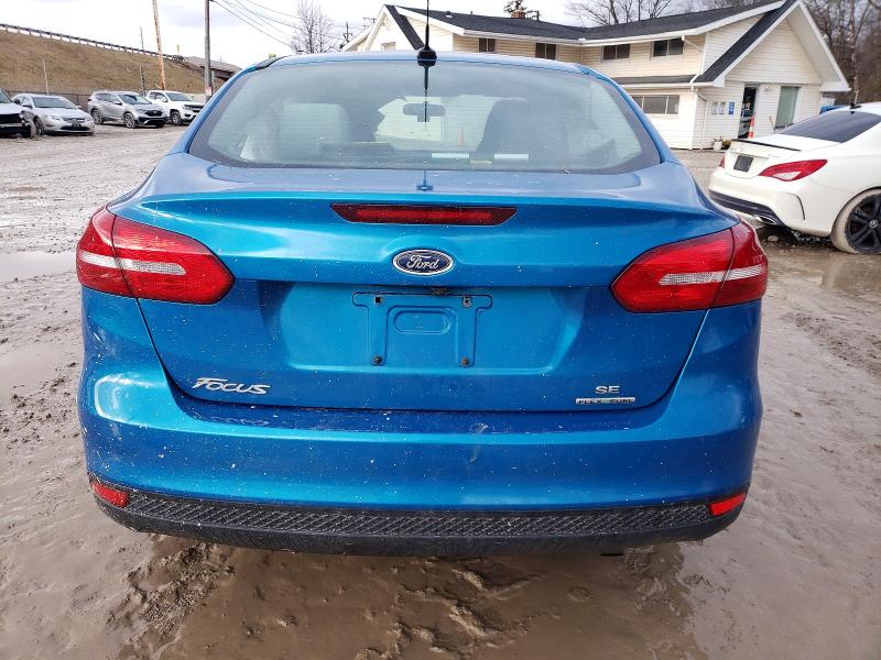 Photo 6 from auction – 2016 FORD FOCUS SE with VIN 1FADP3F20GL243409