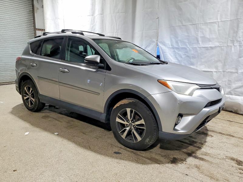 Photo 4 from auction – 2017 TOYOTA RAV4 XLE with VIN 2T3RFREV7HW552990