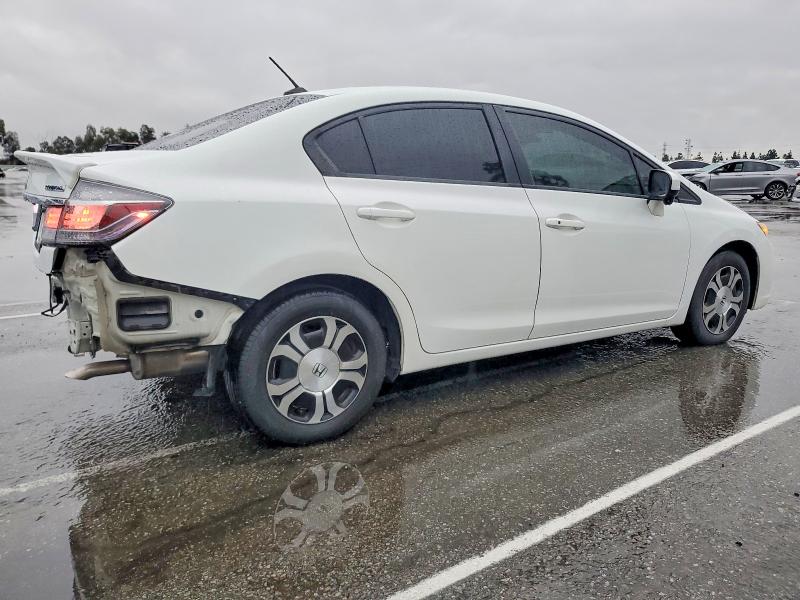 Photo 3 from auction – 2014 HONDA CIVIC HYBR with VIN 19XFB4F21EE201585