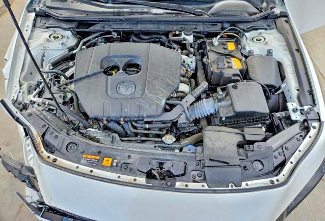Photo 11 from auction – 2024 MAZDA 3 with VIN JM1BPAMM2R1707437
