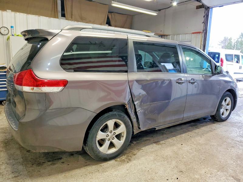 Photo 3 from auction – 2013 TOYOTA SIENNA LE with VIN 5TDKK3DC6DS281975