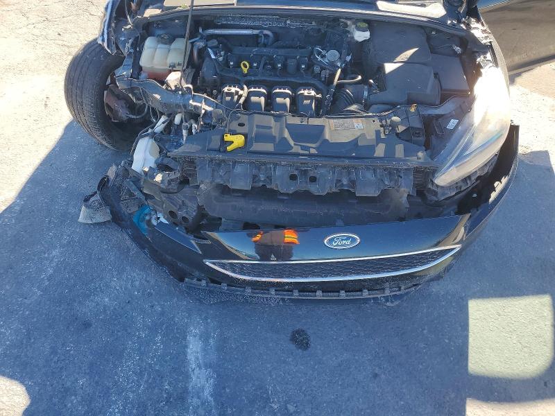 Photo 11 from auction – 2018 FORD FOCUS with VIN 1FADP3M26JL297825