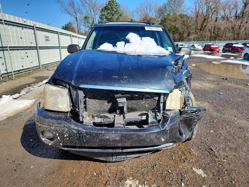 Photo 5 from auction – 2006 GMC ENVOY with VIN 1GKDT13S362320328