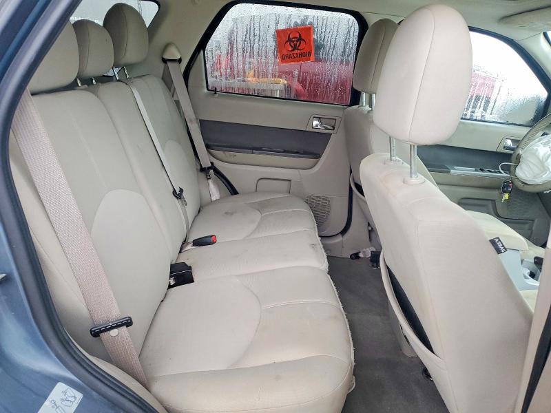 Photo 11 from auction – 2010 MERCURY MARINER with VIN 4M2CN8B76AKJ14933