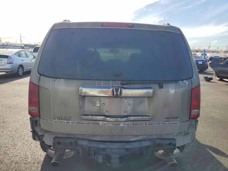 Photo 6 from auction – 2011 HONDA PILOT TOUR with VIN 5FNYF4H90BB062644
