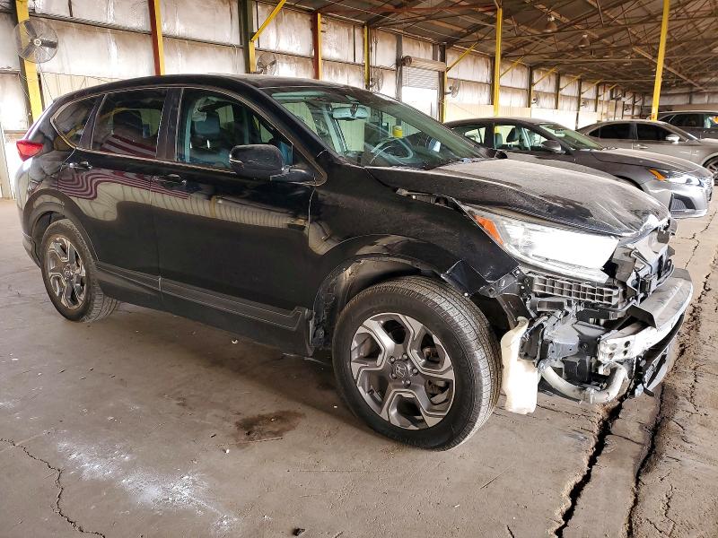 Photo 4 from auction – 2017 HONDA CR-V with VIN 7FARW1H8XHE038682