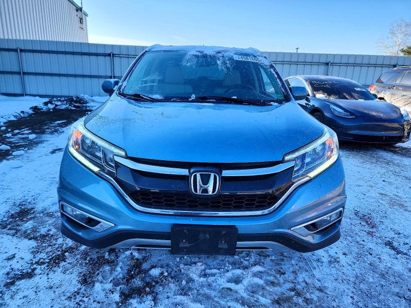 Photo 5 from auction – 2016 HONDA CR-V EXL with VIN 2HKRM4H77GH667665