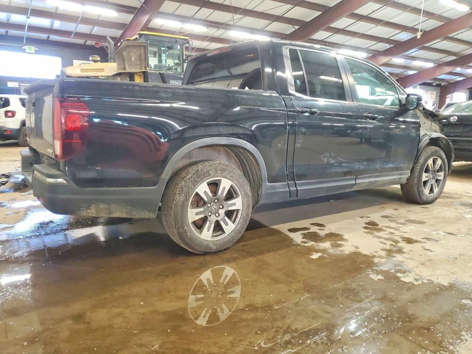 Photo 3 from auction – 2017 HONDA RIDGELINE with VIN 5FPYK3F55HB030391