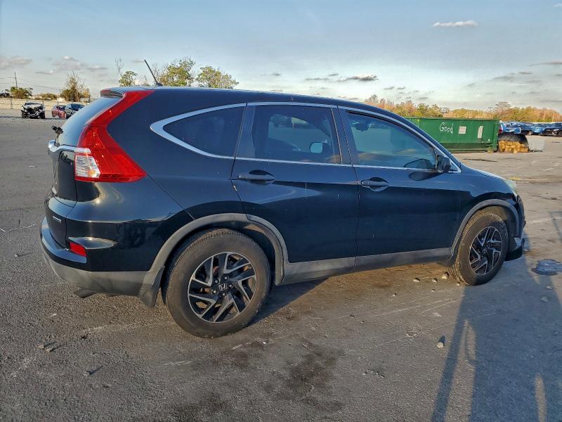 Photo 3 from auction – 2016 HONDA CR-V SE with VIN 2HKRM3H4XGH525018
