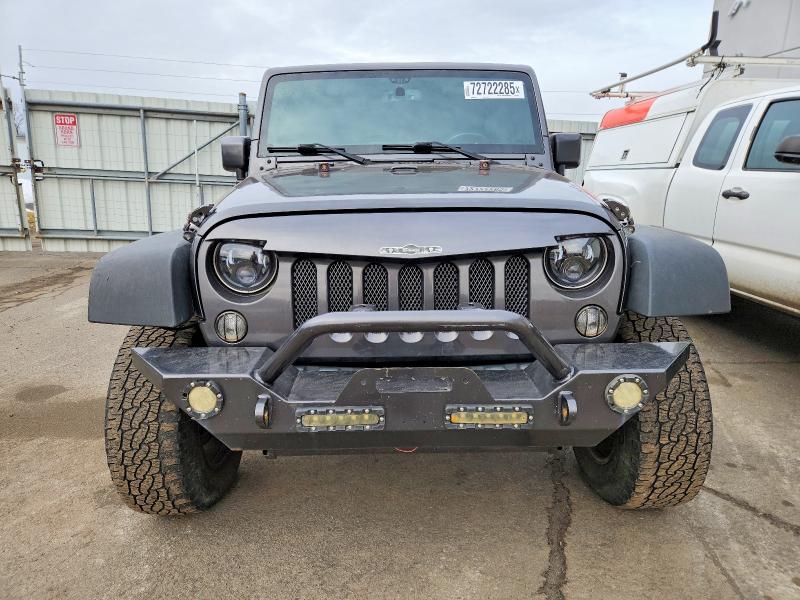 Photo 5 from auction – 2016 JEEP WRANGLER U with VIN 1C4BJWDG4GL292213