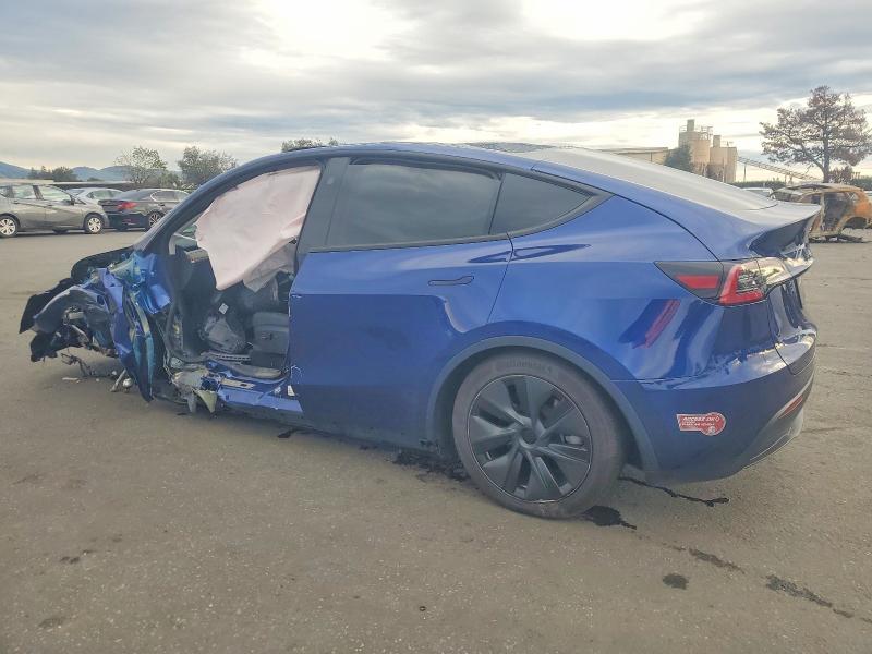 Photo 2 from auction – 2025 TESLA MODEL Y with VIN 7SAYGDED1SF236715