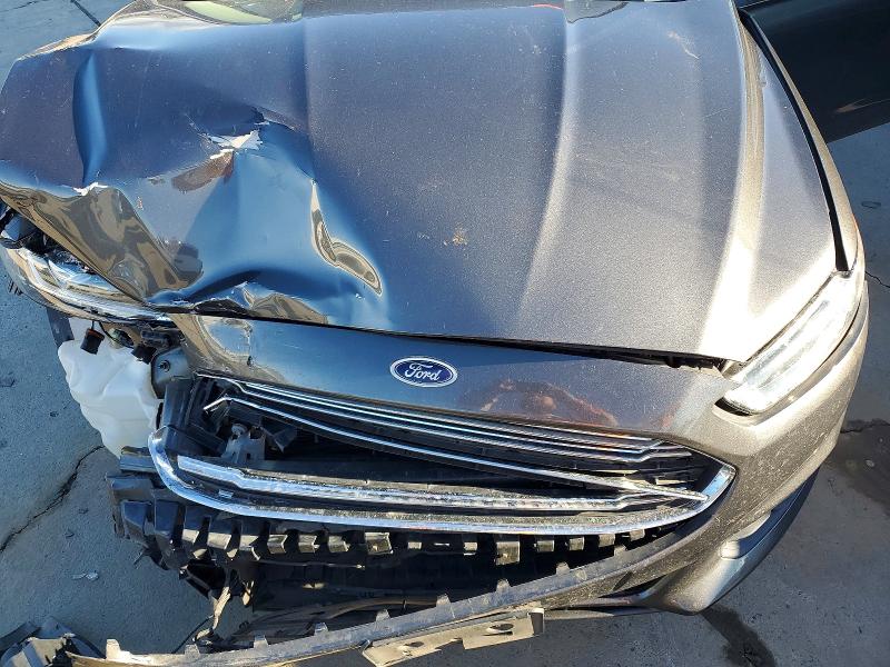 Photo 11 from auction – 2015 FORD FUSION with VIN 3FA6P0H90FR235134