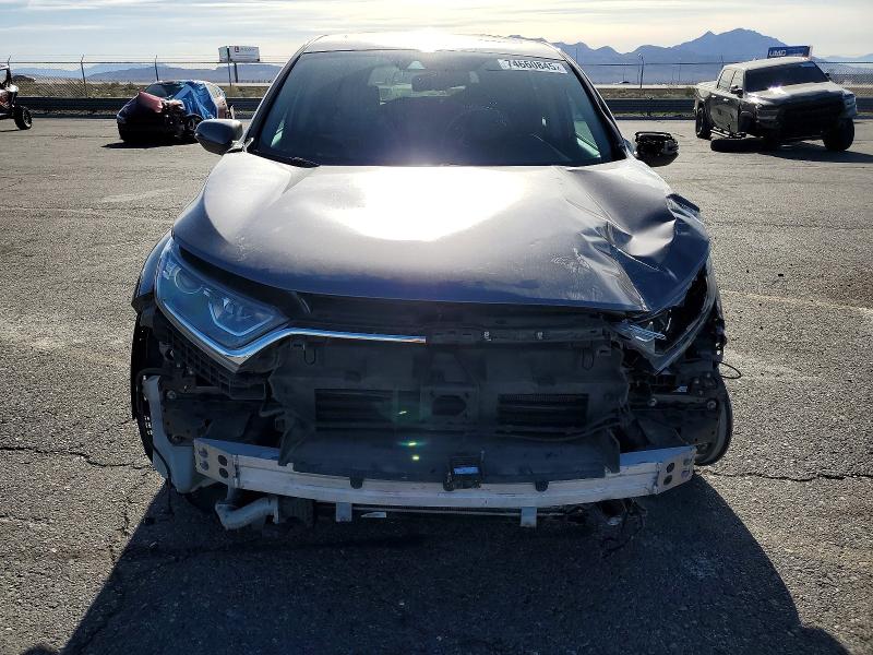 Photo 5 from auction – 2018 HONDA CR-V with VIN 7FARW1H86JE021397