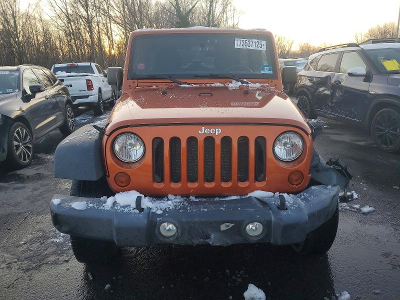 Photo 5 from auction – 2011 JEEP WRANGLER U with VIN 1J4HA5H1XBL572649