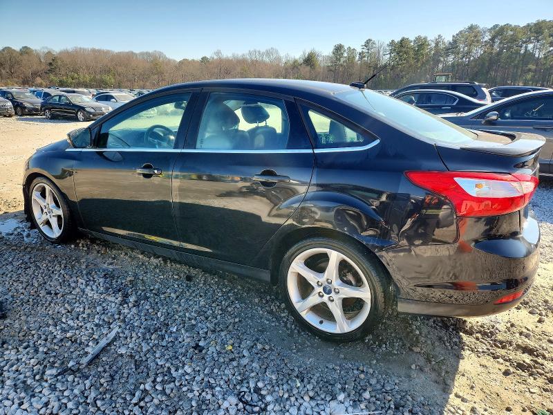 Photo 2 from auction – 2013 FORD FOCUS TITA with VIN 1FADP3J23DL112722