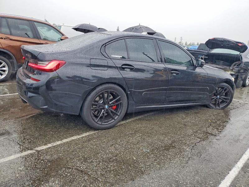 Photo 3 from auction – 2021 BMW M340I with VIN 3MW5U7J00M8B85337