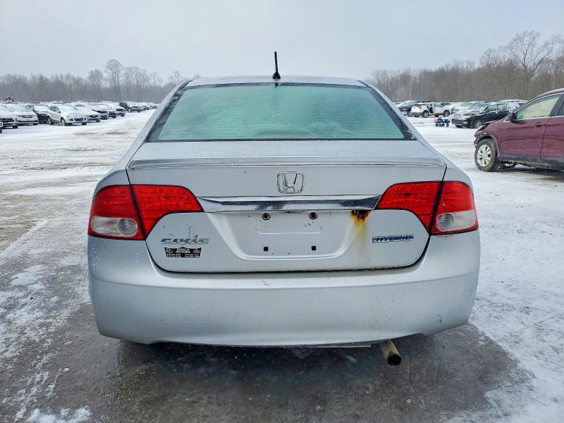 Photo 6 from auction – 2009 HONDA CIVIC HYBR with VIN JHMFA36259S010346