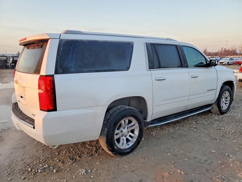 Photo 3 from auction – 2019 CHEVROLET SUBURBAN with VIN 1GNSCJKC8KR110569