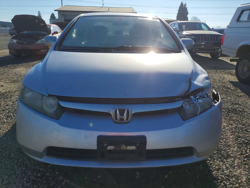 Photo 5 from auction – 2006 HONDA CIVIC HYBR with VIN JHMFA36296S013665
