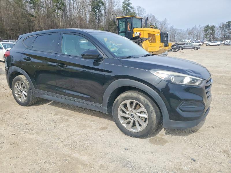 Photo 4 from auction – 2016 HYUNDAI TUCSON SE with VIN KM8J23A48GU114988