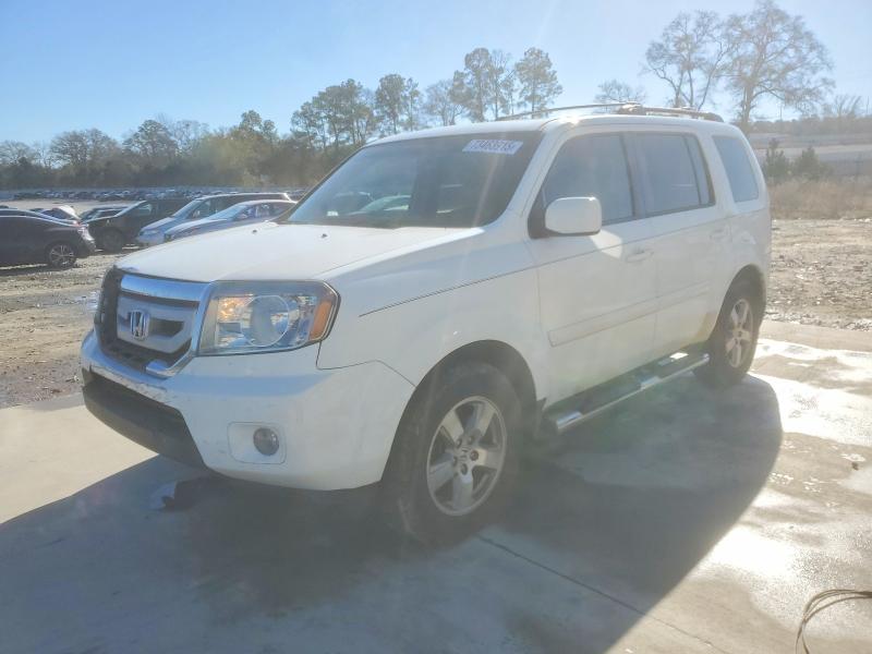 HONDA PILOT EXL 2011 with VIN 5FNYF3H56BB040574 - Photo from auction