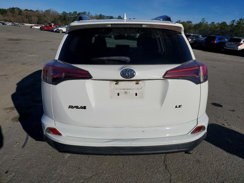 Photo 6 from auction – 2018 TOYOTA RAV4 LE with VIN JTMZFREV3JD109836