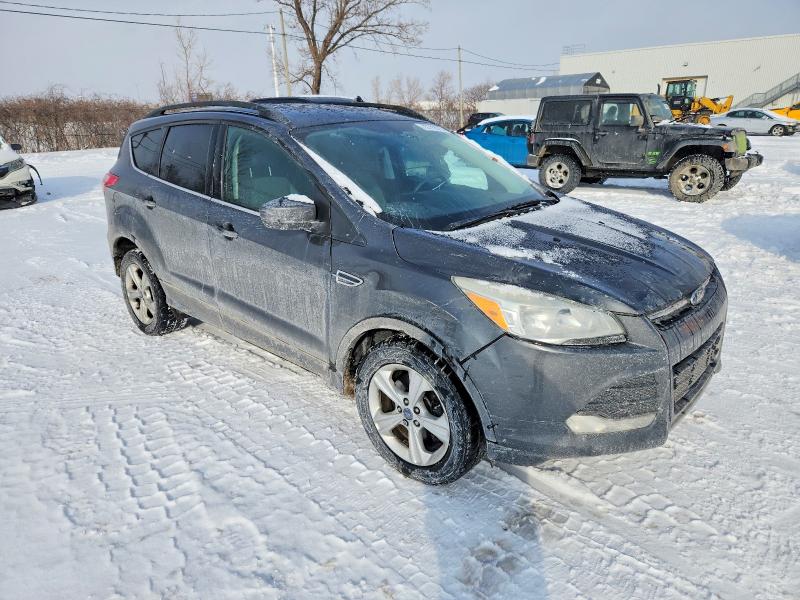 Photo 4 from auction – 2015 FORD ESCAPE SE with VIN 1FMCU9GXXFUA01615