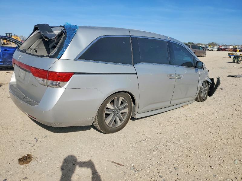 Photo 3 from auction – 2014 HONDA ODYSSEY with VIN 5FNRL5H97EB034251