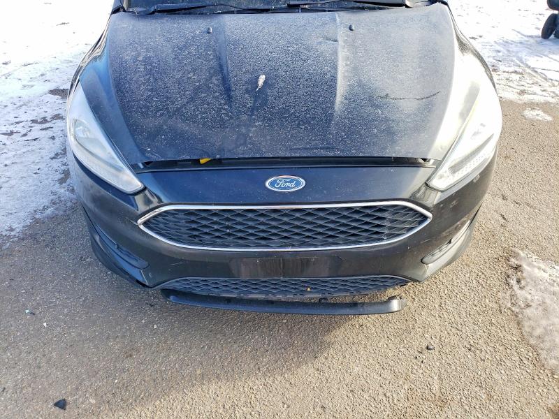 Photo 11 from auction – 2016 FORD FOCUS with VIN 1FADP3F25GL237055