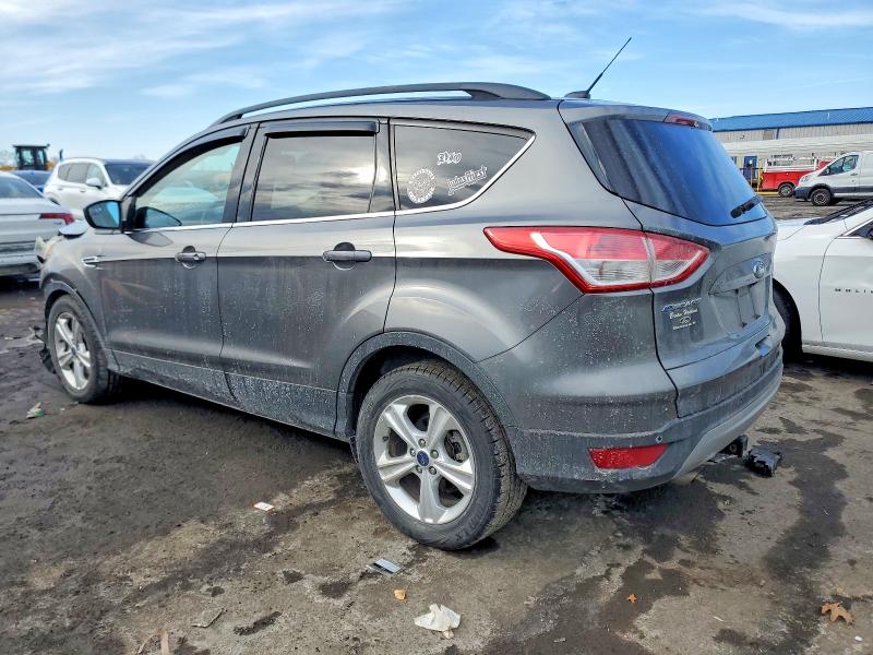 Photo 2 from auction – 2014 FORD ESCAPE SE with VIN 1FMCU9GX5EUD55637