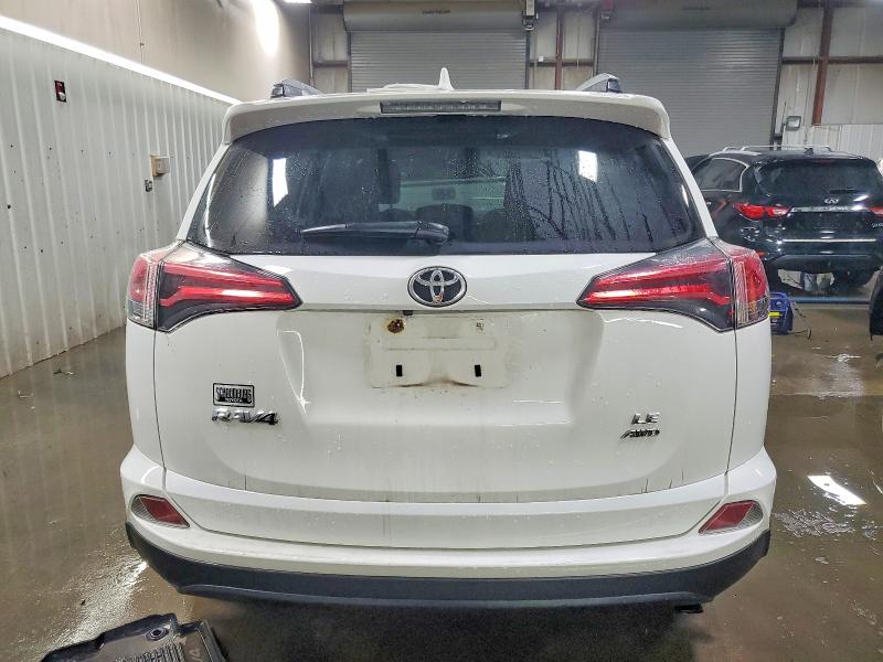 Photo 6 from auction – 2018 TOYOTA RAV4 LE with VIN JTMBFREV4JJ742445
