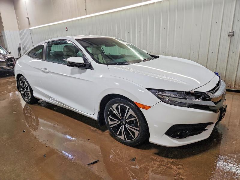Photo 4 from auction – 2017 HONDA CIVIC EX with VIN 2HGFC3B32HH352001