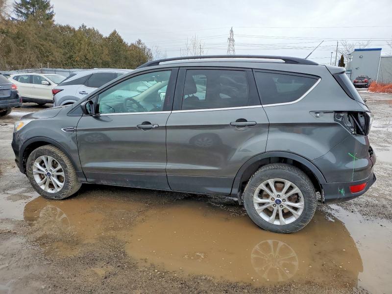 Photo 2 from auction – 2017 FORD ESCAPE SE with VIN 1FMCU9GD2HUA73157