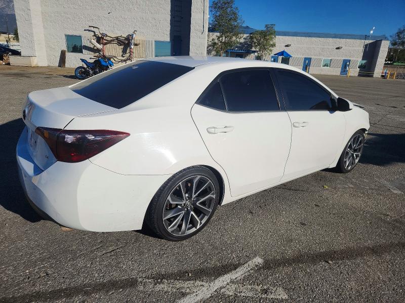Photo 3 from auction – 2015 TOYOTA COROLLA with VIN 5YFBURHE7FP304412