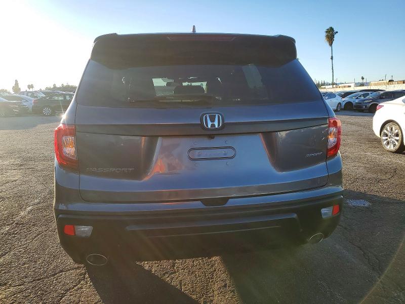 Photo 6 from auction – 2021 HONDA PASSPORT with VIN 5FNYF7H23MB014689