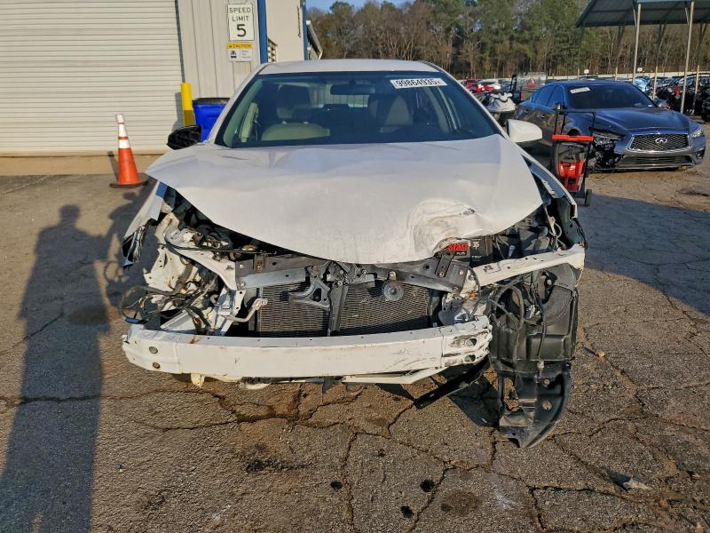 Photo 5 from auction – 2016 TOYOTA COROLLA L with VIN 5YFBURHE8GP438279