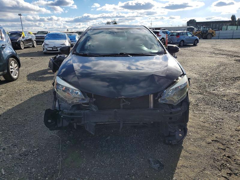 Photo 5 from auction – 2014 TOYOTA COROLLA L with VIN 5YFBURHE4EP028902