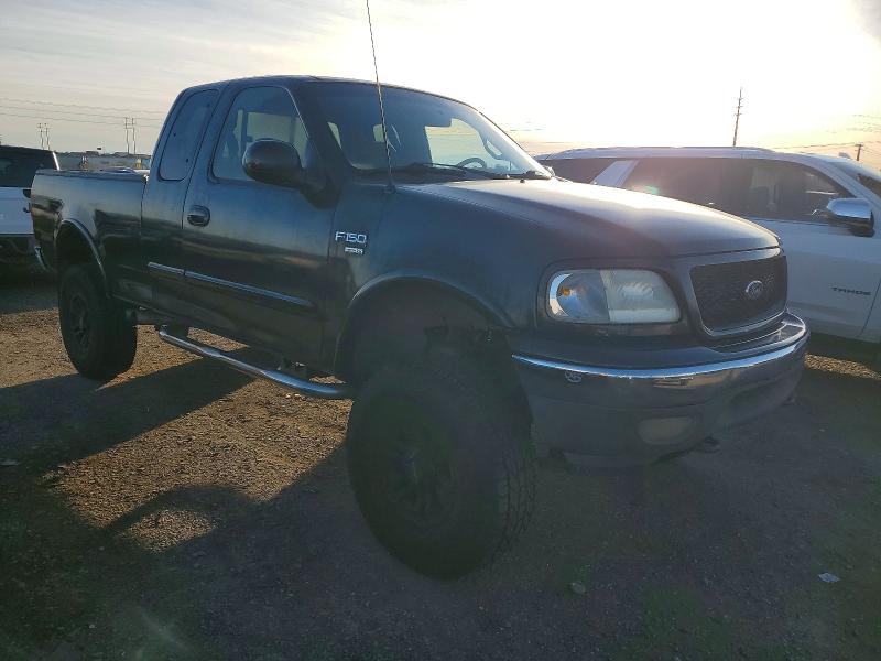 Photo 4 from auction – 2000 FORD F150 with VIN 1FTRX18L1YKA51241