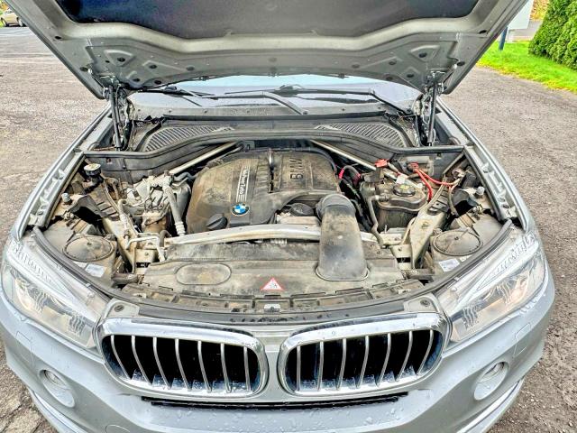 Photo 7 from auction – 2015 BMW X5 with VIN 5UXKR0C56F0P09402