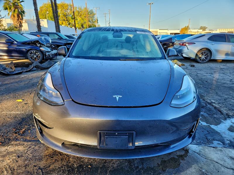 Photo 5 from auction – 2022 TESLA MODEL 3 with VIN 5YJ3E1EA8NF289319