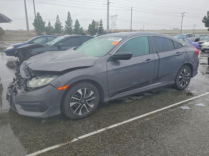 HONDA CIVIC 2018 with VIN 2HGFC2F55JH502291 - Photo from auction