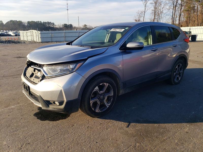 HONDA CR-V EX 2017 with VIN 7FARW1H5XHE034623 - Photo from auction