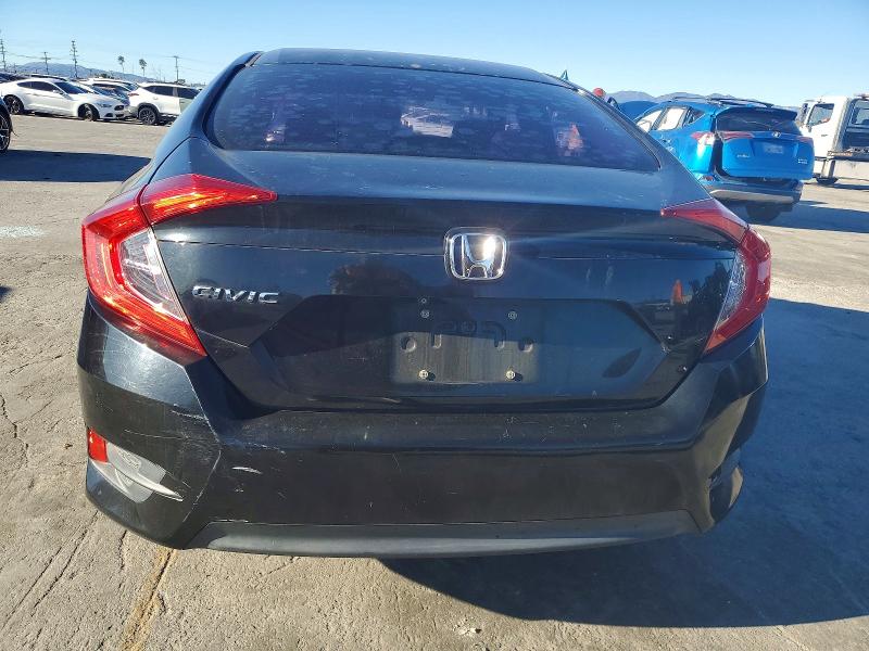Photo 6 from auction – 2016 HONDA CIVIC LX with VIN 2HGFC2F52GH512236