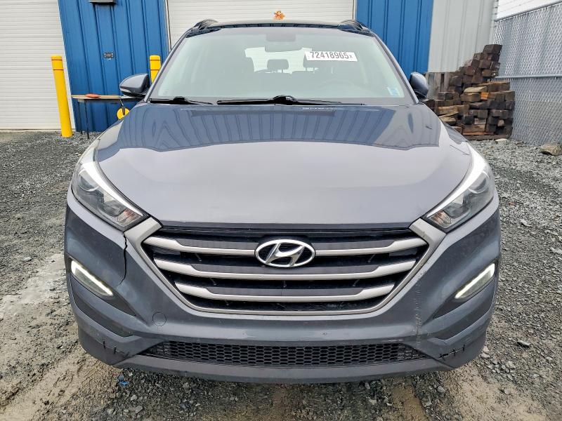 Photo 5 from auction – 2017 HYUNDAI TUCSON LIM with VIN KM8J3CA49HU496639