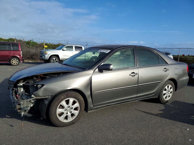 TOYOTA CAMRY LE 2003 with VIN JTDBF32K030138083 - Photo from auction