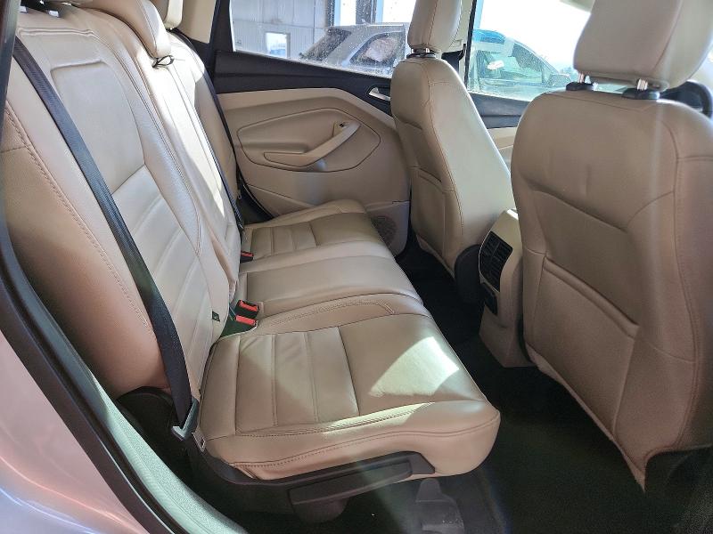 Photo 11 from auction – 2019 FORD ESCAPE TIT with VIN 1FMCU9J90KUA63271
